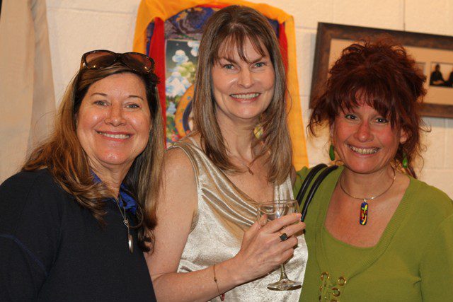 book launch recap - Carolyn Dismuke and book launch attendees smile for the camera
